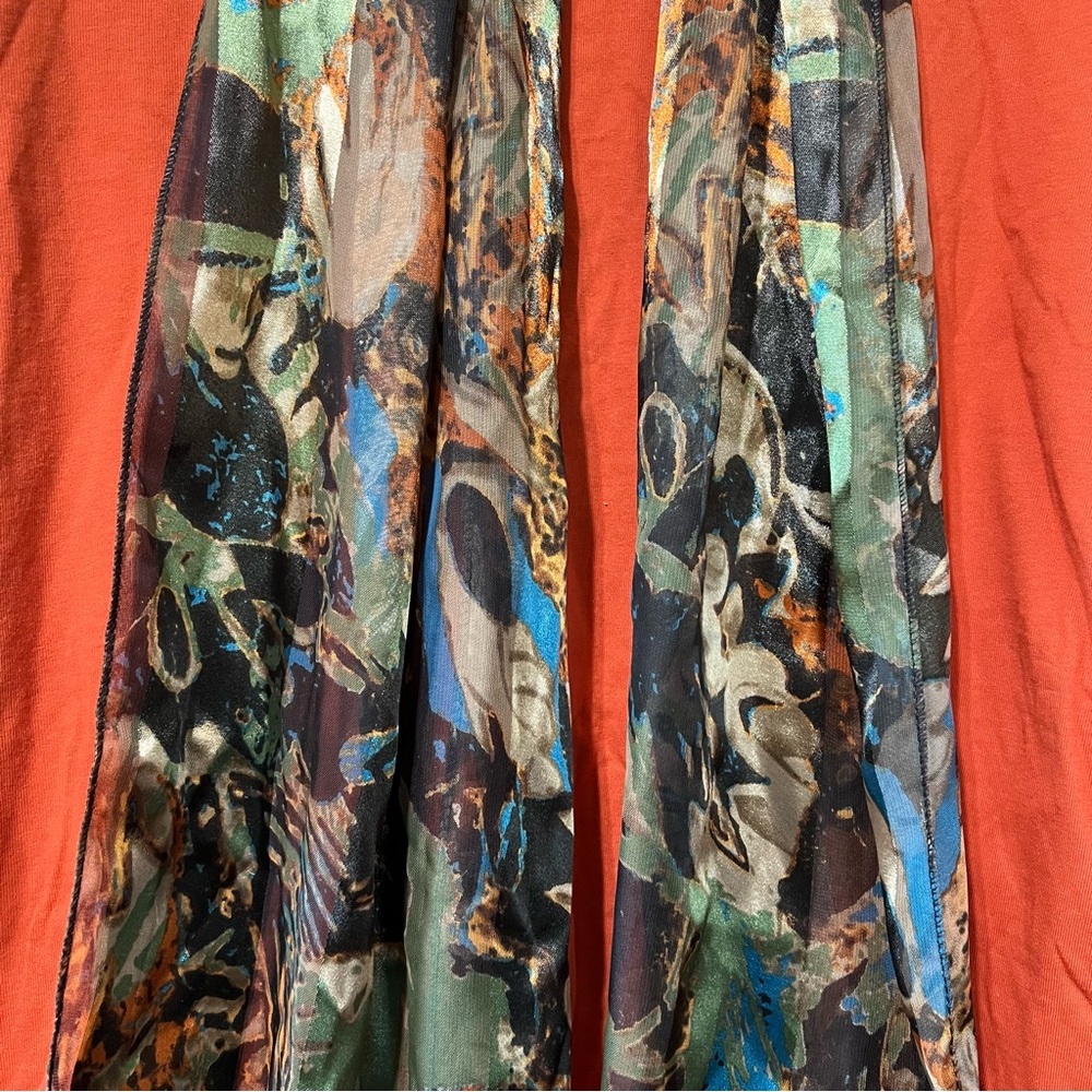 Beautiful Scarf 60”long x 12 1/2” wide .  Made of 100% Polyester